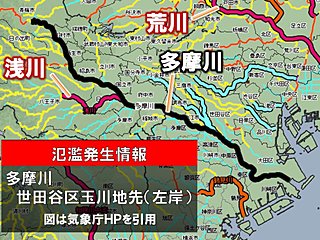 台風19号　多摩川で氾濫発生